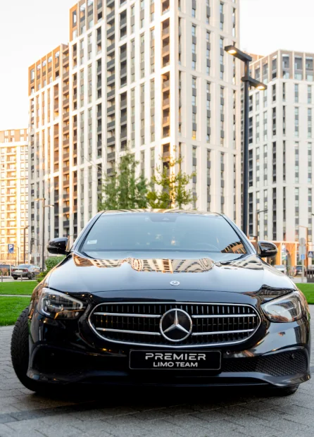 Photo of in Premier Limo Team - Mercedes-Benz E-Class 2023 front of buildings