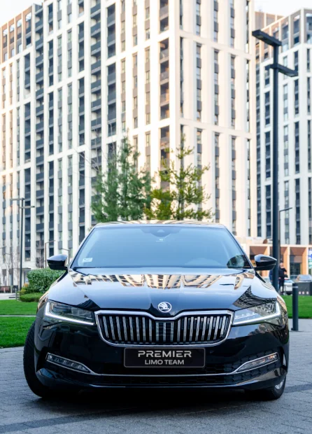 Photo of Premier Limo Team - Škoda Superb 2022 in front of buildings